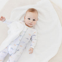 pima cotton baby footie with watercolor dinosaur print